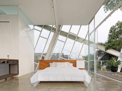 A Stunning Glass House with Slanted Steel Frame and Indoor Pool in Jakarta by Budi Pradono Architects (6)