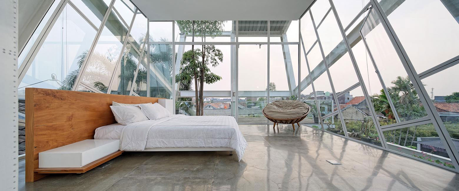 A Stunning Glass House with Slanted Steel Frame and Indoor Pool in Jakarta by Budi Pradono Architects (7)