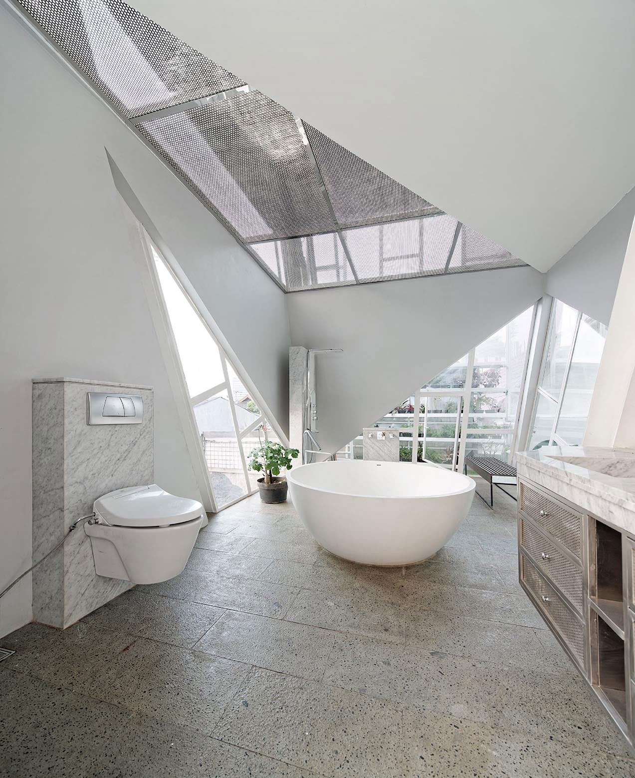A Stunning Glass House with Slanted Steel Frame and Indoor Pool in Jakarta by Budi Pradono Architects (9)