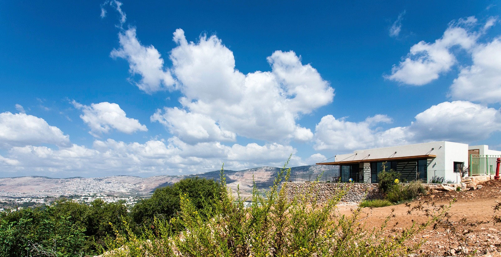 A Stunning Modern Home Perched on Top of a Rocky Hill Overlooking the Mountains in Mikhmanim, Israel by SaaB Architects (2)