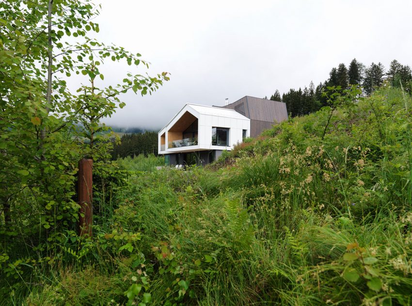 A Stunning Mountain House Nestled on the Hillside Overlooking the Austrian Alps in Austria by SoNo arhitekti (1)