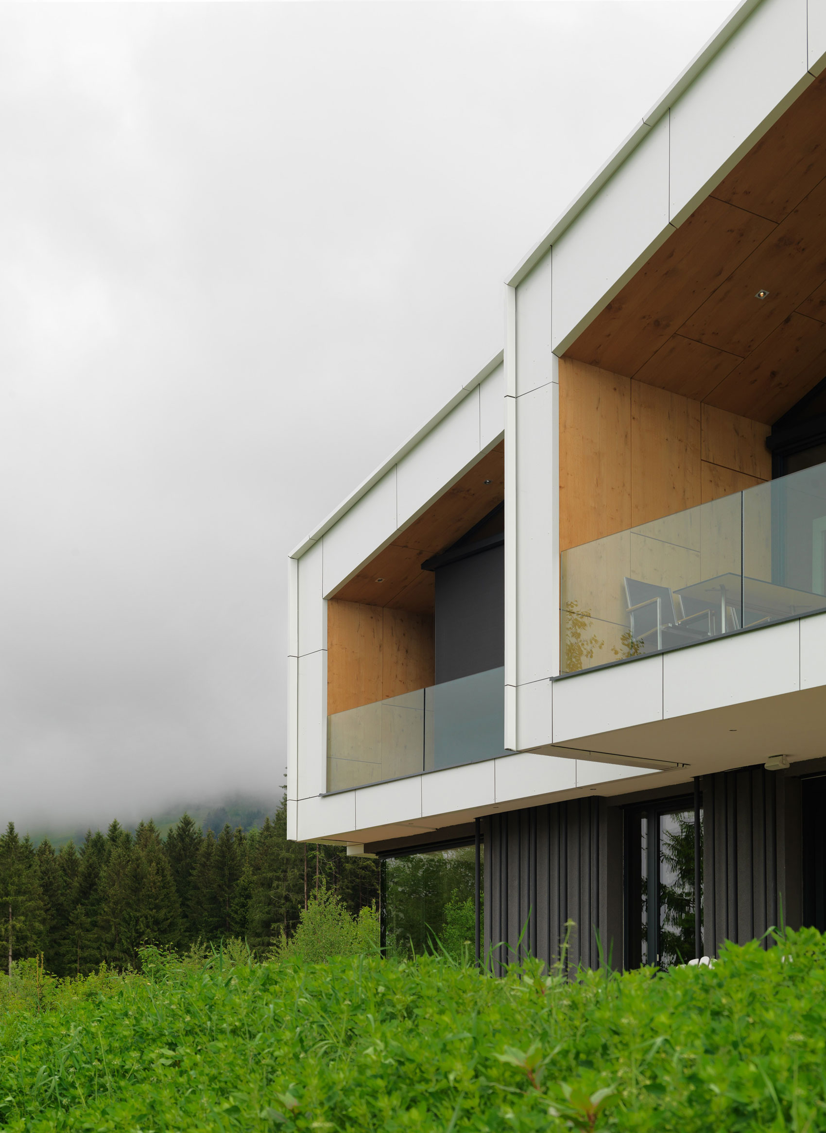 A Stunning Mountain House Nestled on the Hillside Overlooking the Austrian Alps in Austria by SoNo arhitekti (4)