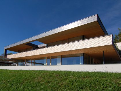 A Stunning and Elegant Home Built on a Slope Overlooks Beautiful Mountains of Liechtenstein by k m architektur (1)