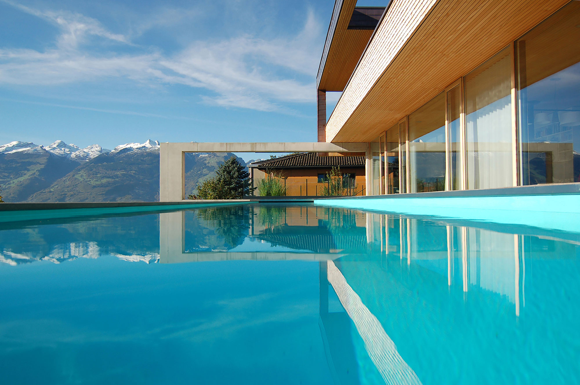 A Stunning and Elegant Home Built on a Slope Overlooks Beautiful Mountains of Liechtenstein by k m architektur (10)