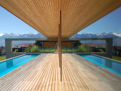 A Stunning and Elegant Home Built on a Slope Overlooks Beautiful Mountains of Liechtenstein by k m architektur (11)