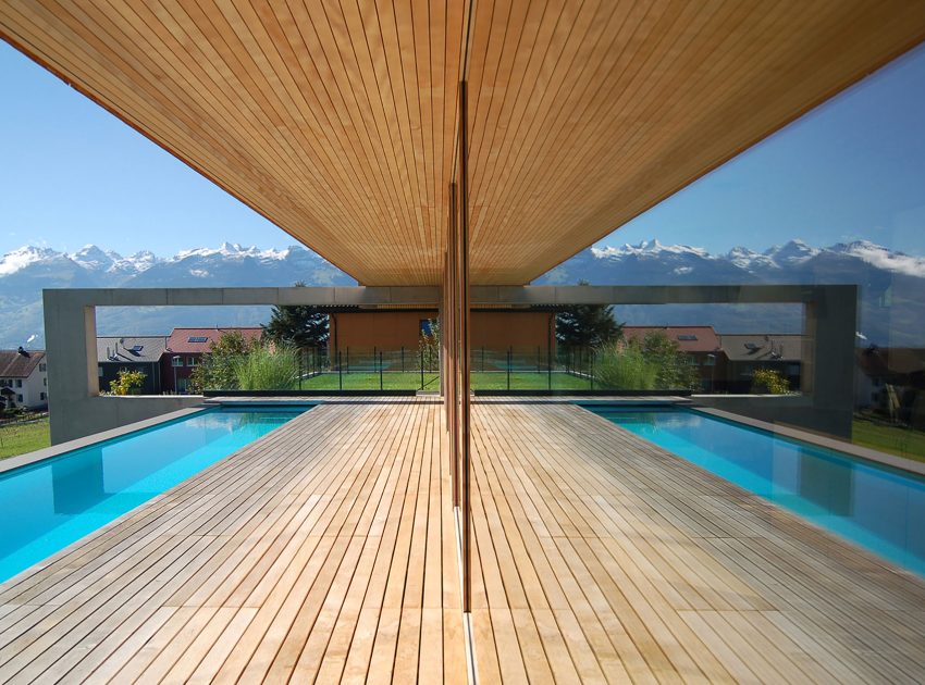 A Stunning and Elegant Home Built on a Slope Overlooks Beautiful Mountains of Liechtenstein by k m architektur (11)