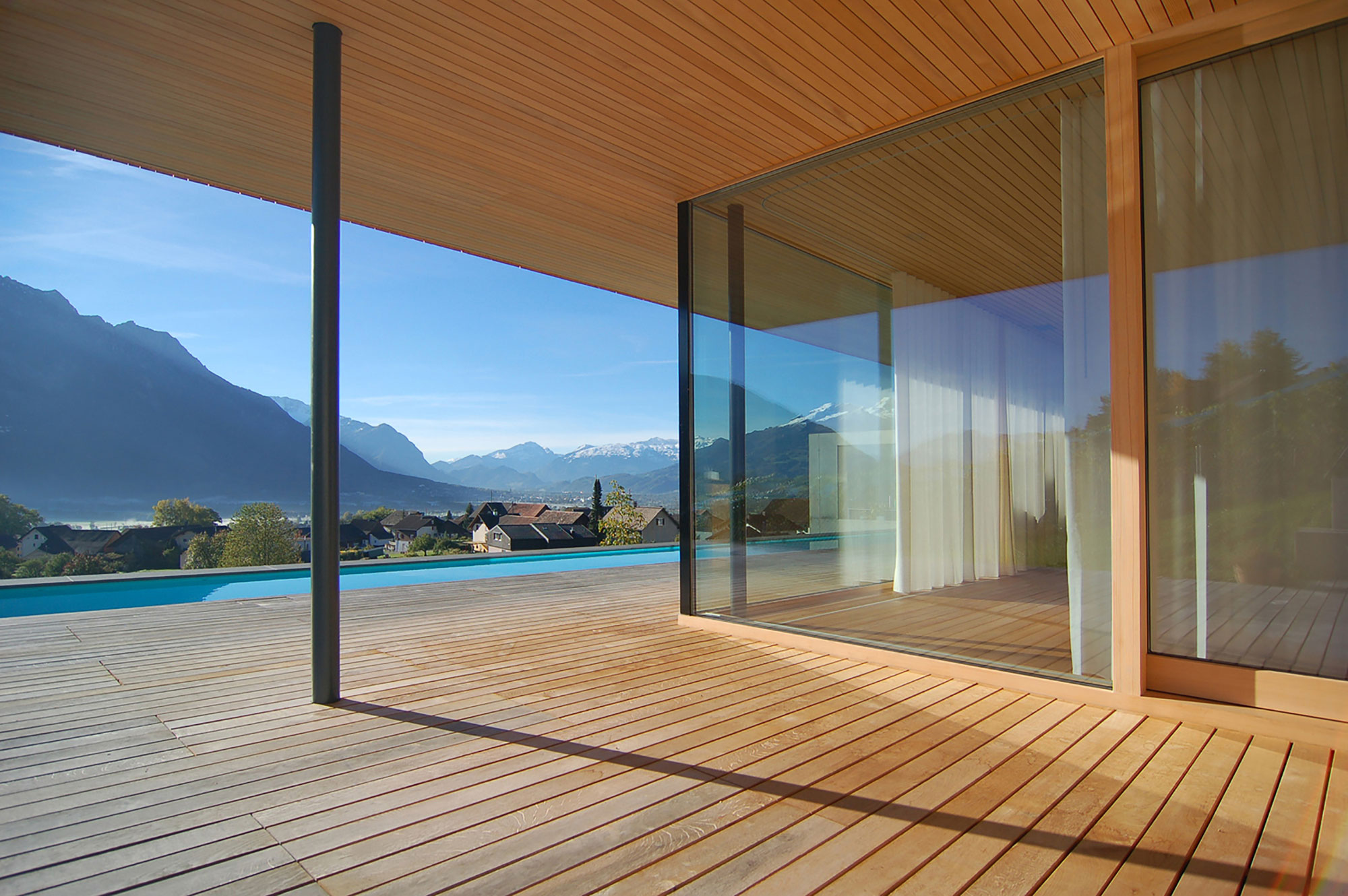 A Stunning and Elegant Home Built on a Slope Overlooks Beautiful Mountains of Liechtenstein by k m architektur (13)