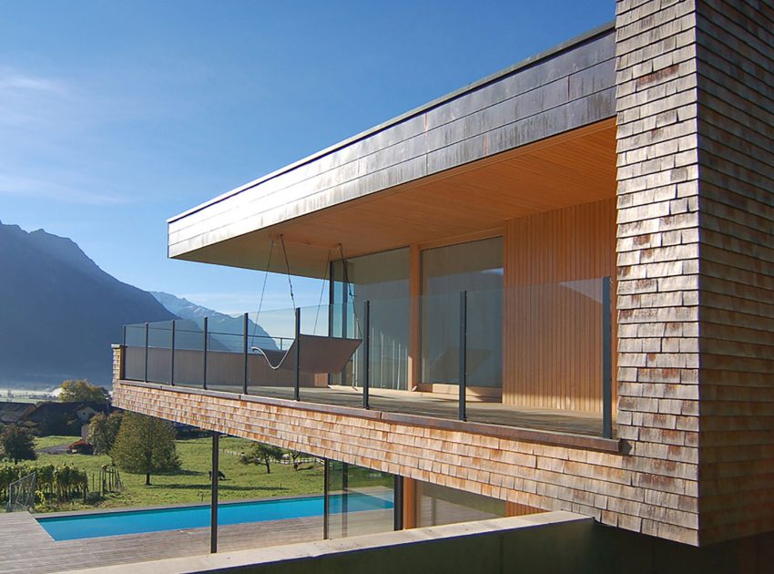 A Stunning and Elegant Home Built on a Slope Overlooks Beautiful Mountains of Liechtenstein by k m architektur (14)