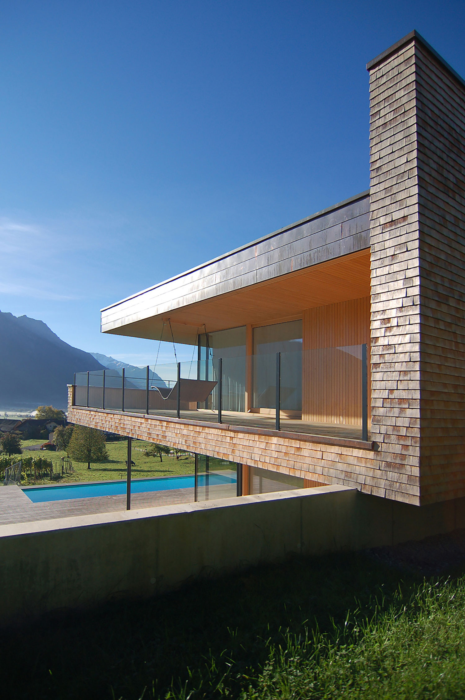 A Stunning and Elegant Home Built on a Slope Overlooks Beautiful Mountains of Liechtenstein by k m architektur (14)