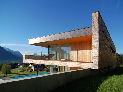 A Stunning and Elegant Home Built on a Slope Overlooks Beautiful Mountains of Liechtenstein by k m architektur (15)