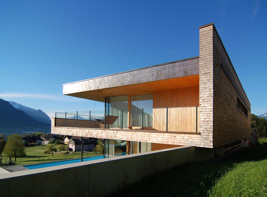 A Stunning and Elegant Home Built on a Slope Overlooks Beautiful Mountains of Liechtenstein by k m architektur (15)