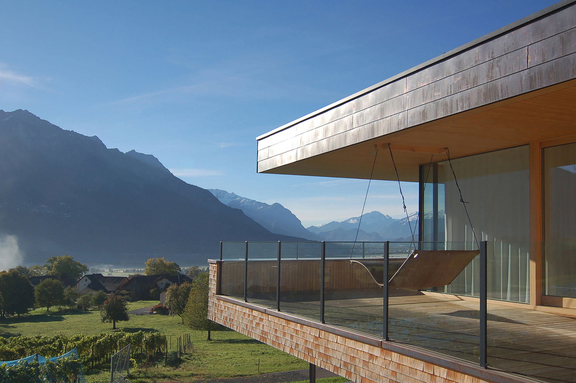 A Stunning and Elegant Home Built on a Slope Overlooks Beautiful Mountains of Liechtenstein by k m architektur (16)
