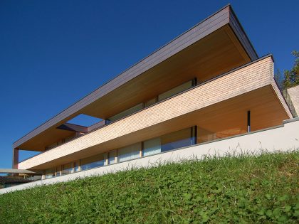 A Stunning and Elegant Home Built on a Slope Overlooks Beautiful Mountains of Liechtenstein by k m architektur (2)