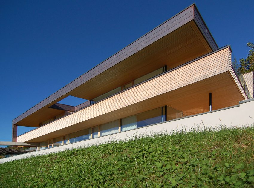 A Stunning and Elegant Home Built on a Slope Overlooks Beautiful Mountains of Liechtenstein by k m architektur (2)