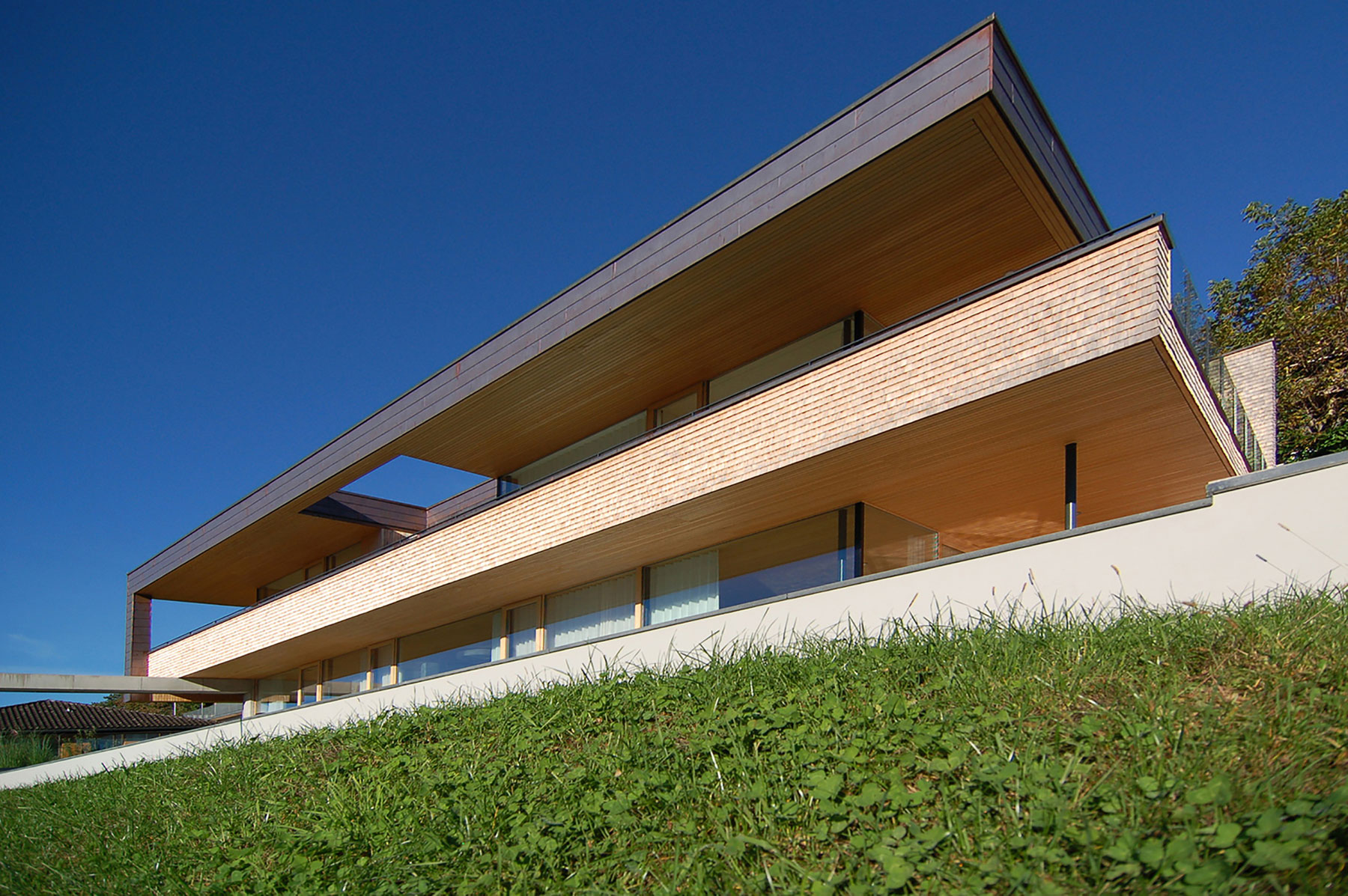 A Stunning and Elegant Home Built on a Slope Overlooks Beautiful Mountains of Liechtenstein by k m architektur (2)