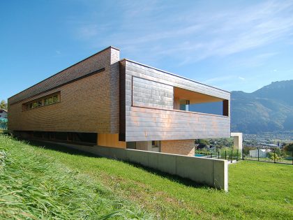 A Stunning and Elegant Home Built on a Slope Overlooks Beautiful Mountains of Liechtenstein by k m architektur (3)