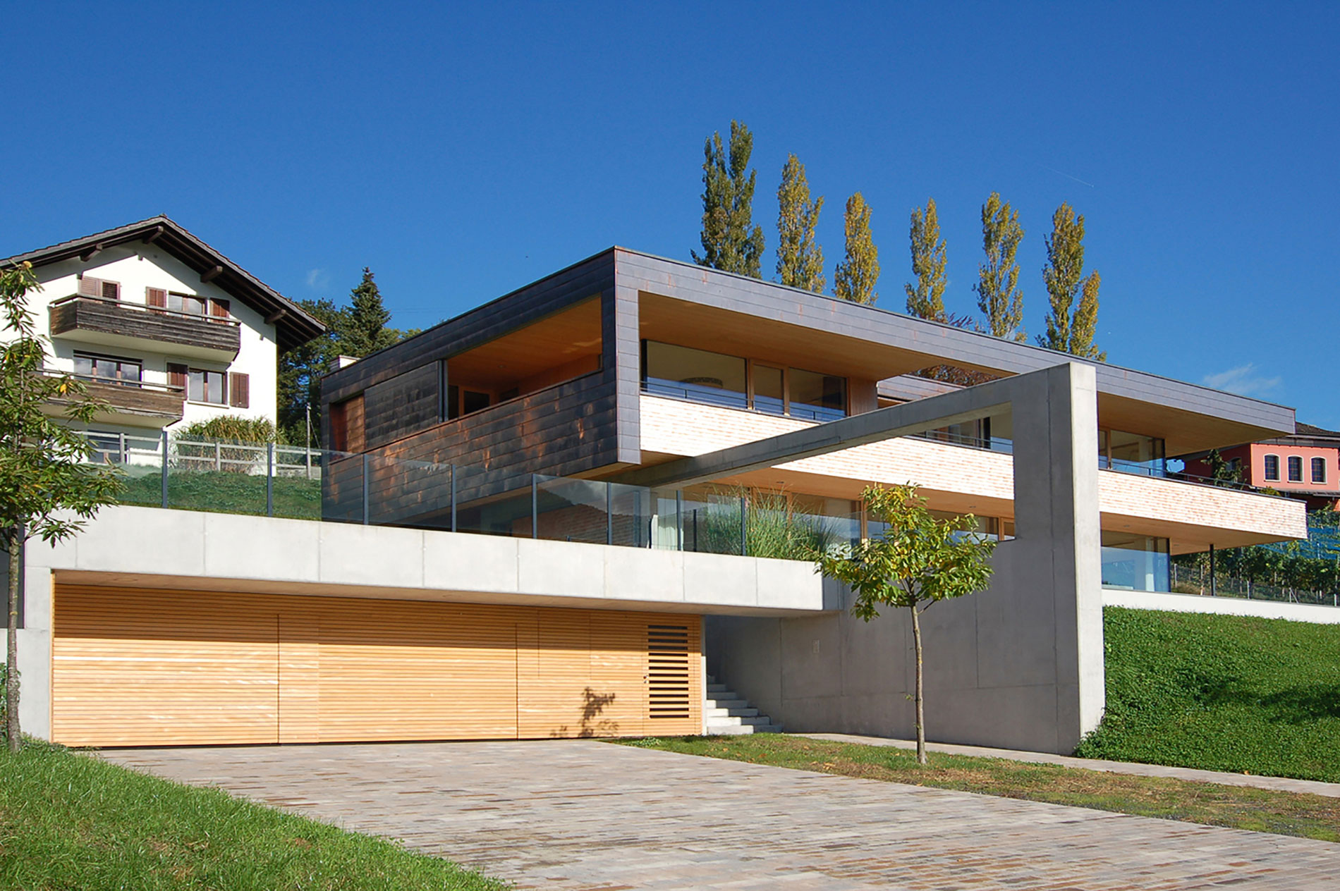 A Stunning and Elegant Home Built on a Slope Overlooks Beautiful Mountains of Liechtenstein by k m architektur (4)
