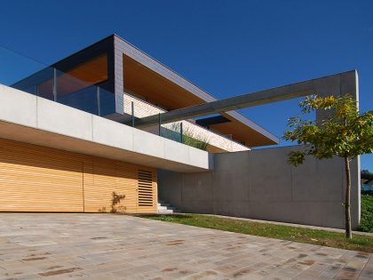 A Stunning and Elegant Home Built on a Slope Overlooks Beautiful Mountains of Liechtenstein by k m architektur (5)