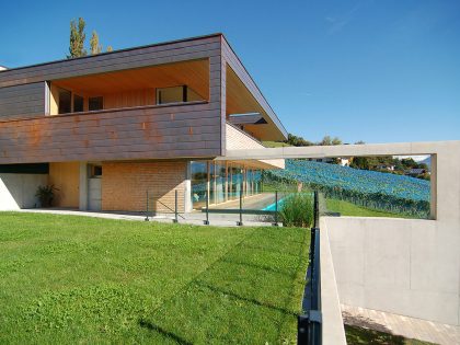 A Stunning and Elegant Home Built on a Slope Overlooks Beautiful Mountains of Liechtenstein by k m architektur (6)