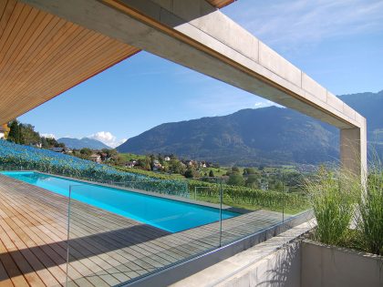 A Stunning and Elegant Home Built on a Slope Overlooks Beautiful Mountains of Liechtenstein by k m architektur (7)