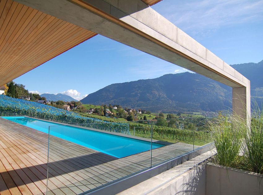 A Stunning and Elegant Home Built on a Slope Overlooks Beautiful Mountains of Liechtenstein by k m architektur (7)