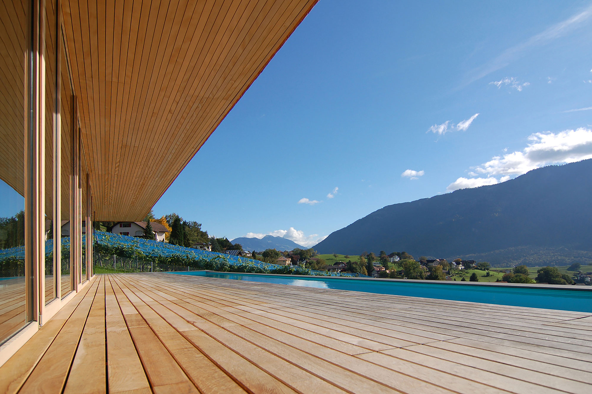 A Stunning and Elegant Home Built on a Slope Overlooks Beautiful Mountains of Liechtenstein by k m architektur (8)