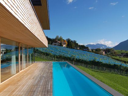 A Stunning and Elegant Home Built on a Slope Overlooks Beautiful Mountains of Liechtenstein by k m architektur (9)