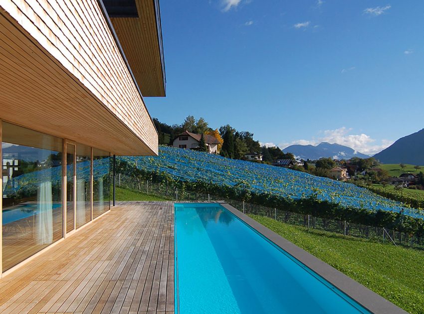 A Stunning and Elegant Home Built on a Slope Overlooks Beautiful Mountains of Liechtenstein by k m architektur (9)