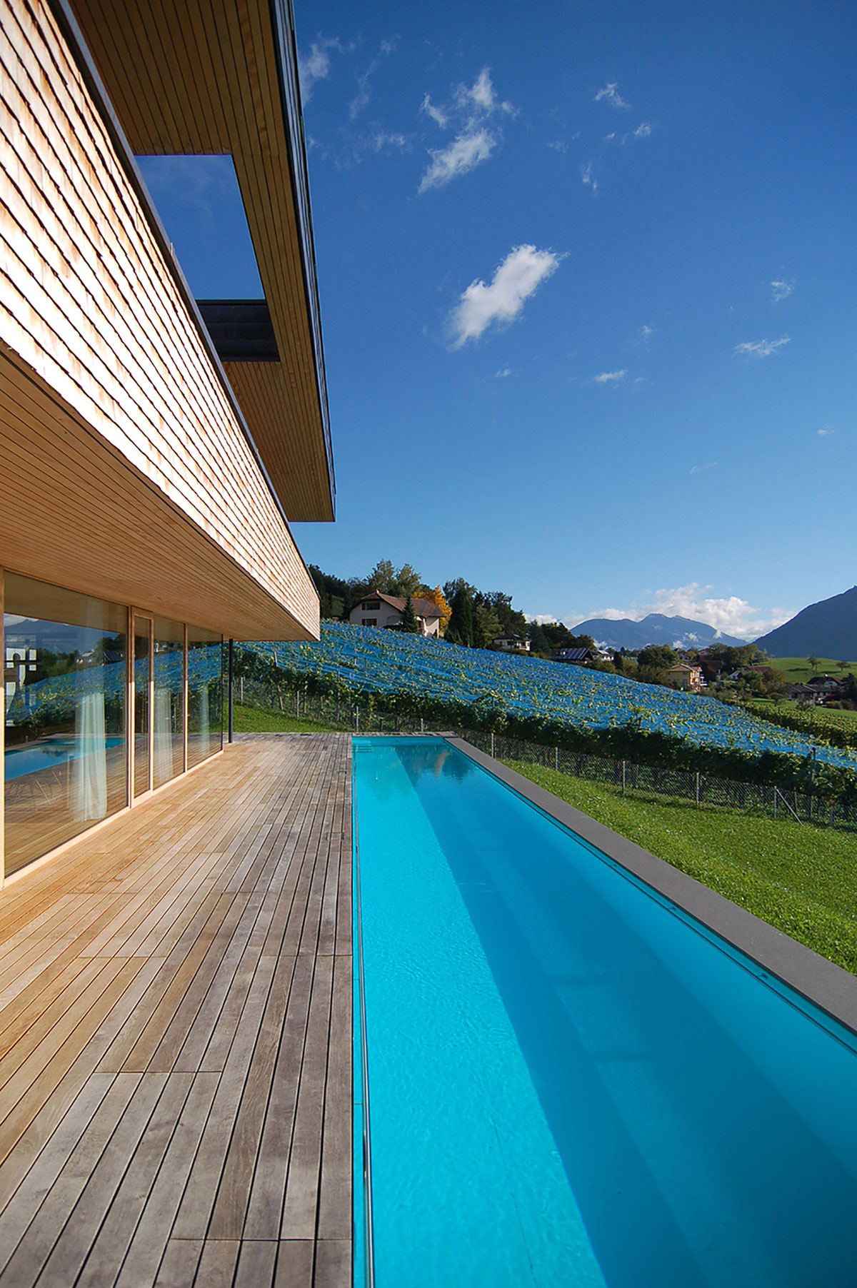 A Stunning and Elegant Home Built on a Slope Overlooks Beautiful Mountains of Liechtenstein by k m architektur (9)