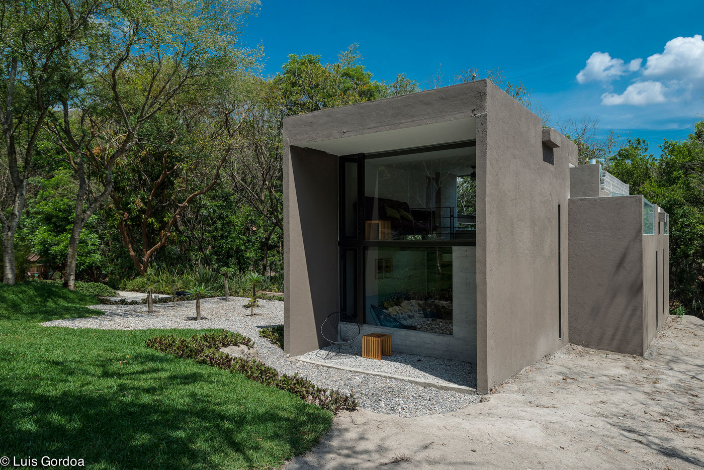 A Stylish Concrete House with Playful and Elegant Interiors in Morelos