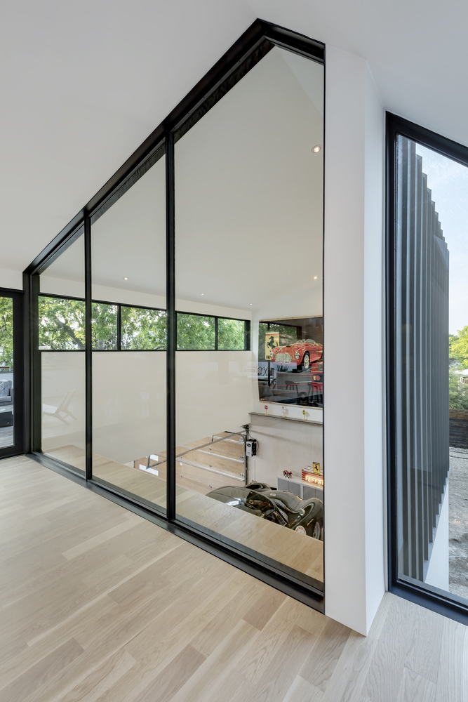 A Stylish Modern Home for a Car Collector in Austin, Texas by Matt Fajkus Architecture (13)