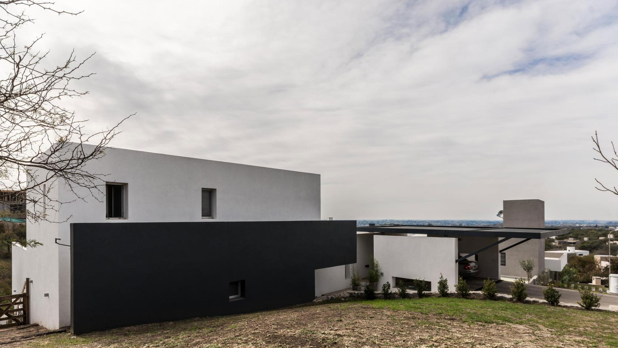 A Stylish Modern Home with Opaque Facade and Clean Lines in Cordoba, Argentina by Federico Olmedo (1)