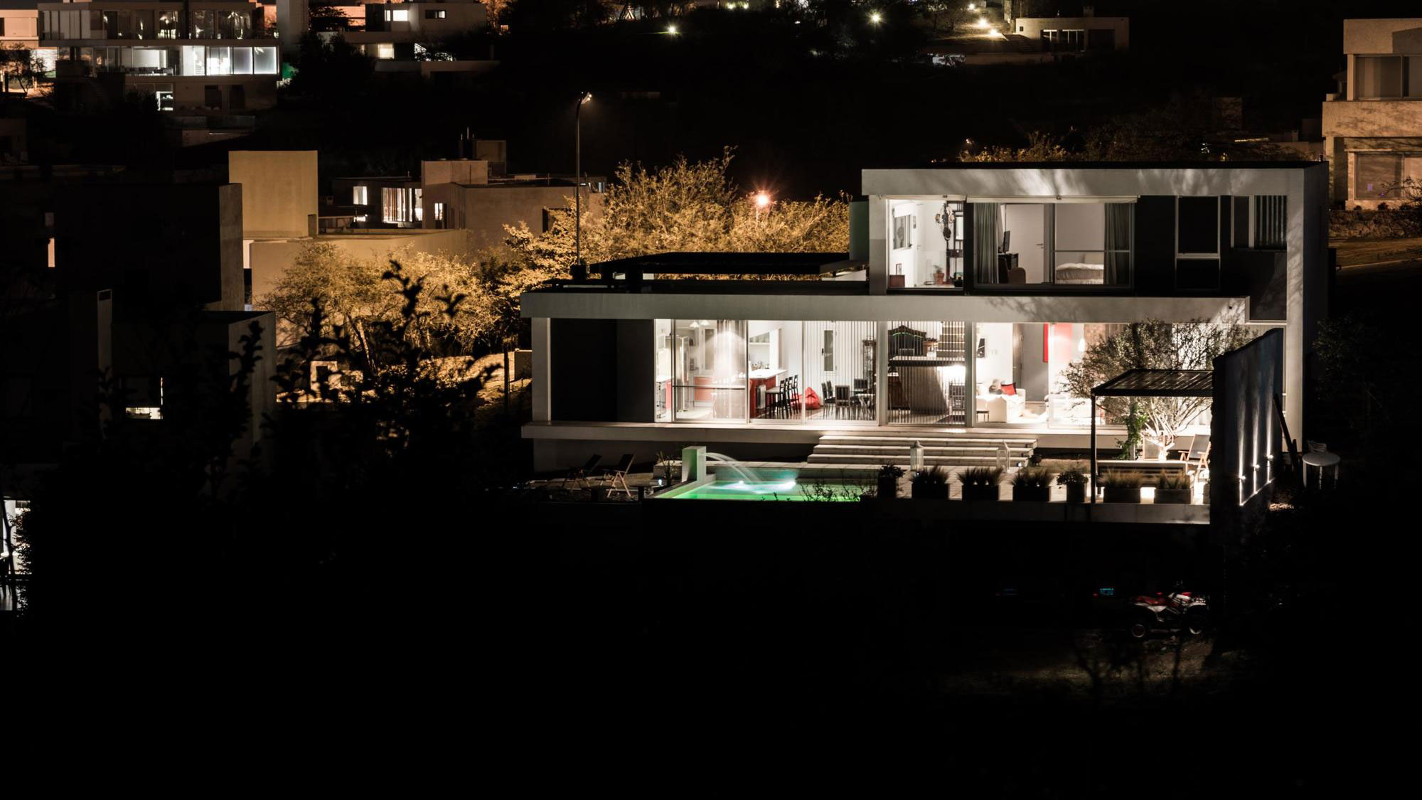 A Stylish Modern Home with Opaque Facade and Clean Lines in Cordoba, Argentina by Federico Olmedo (13)