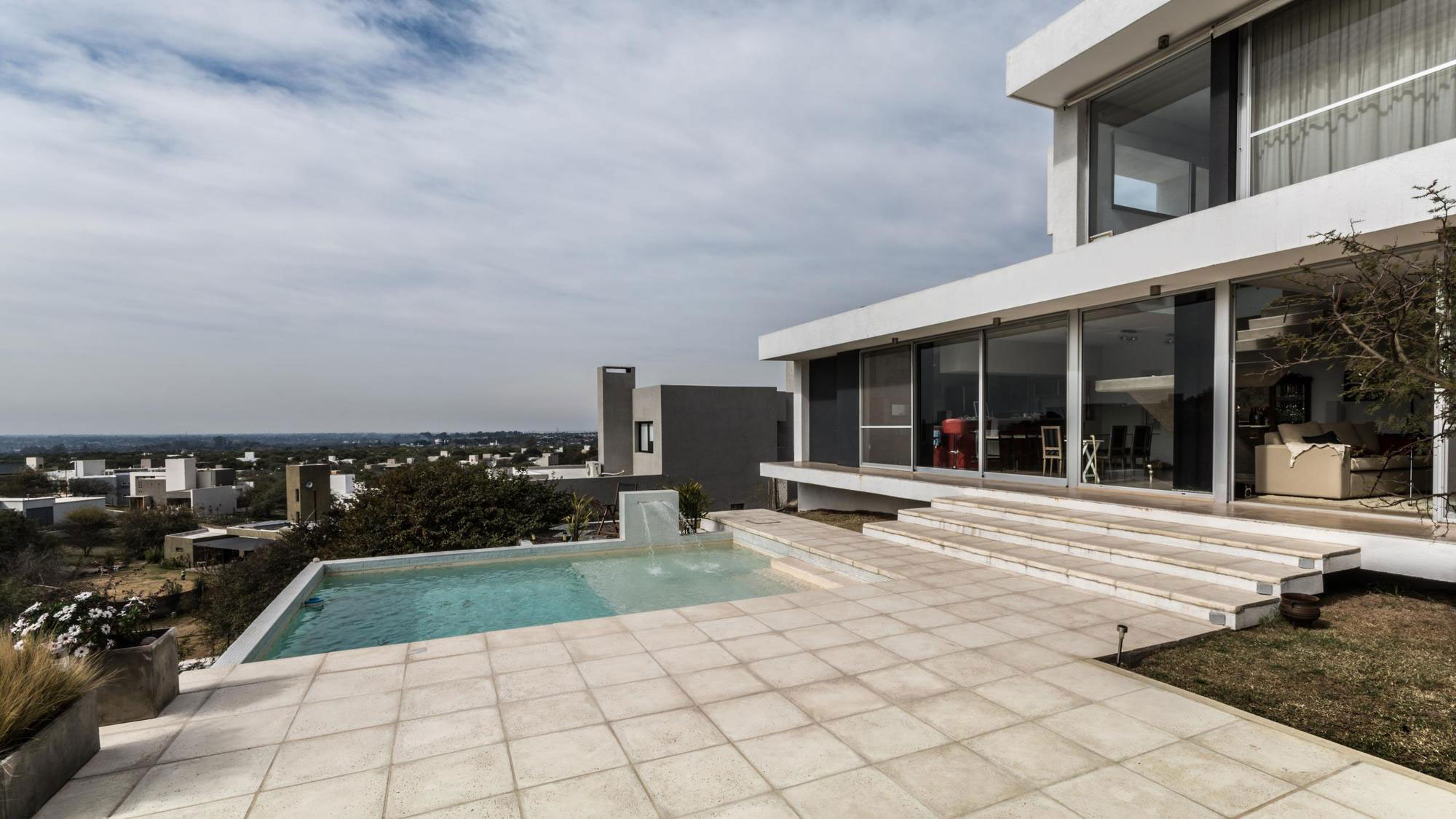 A Stylish Modern Home with Opaque Facade and Clean Lines in Cordoba, Argentina by Federico Olmedo (6)