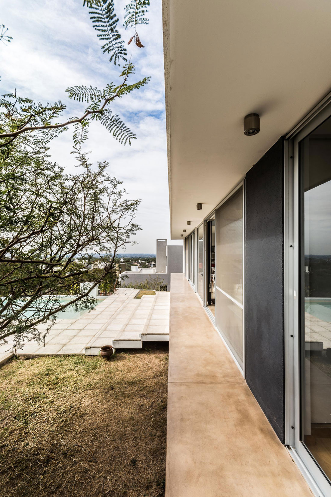 A Stylish Modern Home with Opaque Facade and Clean Lines in Cordoba, Argentina by Federico Olmedo (8)