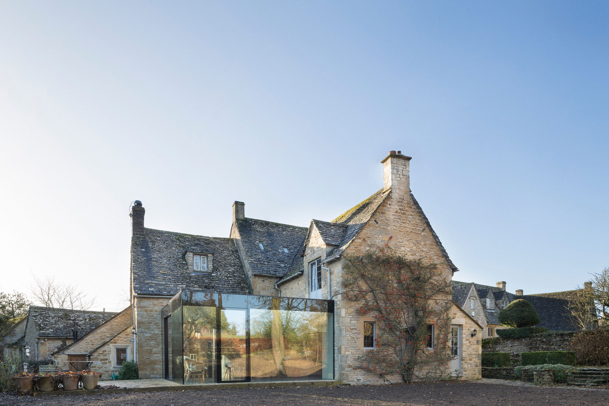 A Stylish Modern Home with Stone Walls and Glass Facade in Oxford, England by Jonathan Tuckey Design (2)