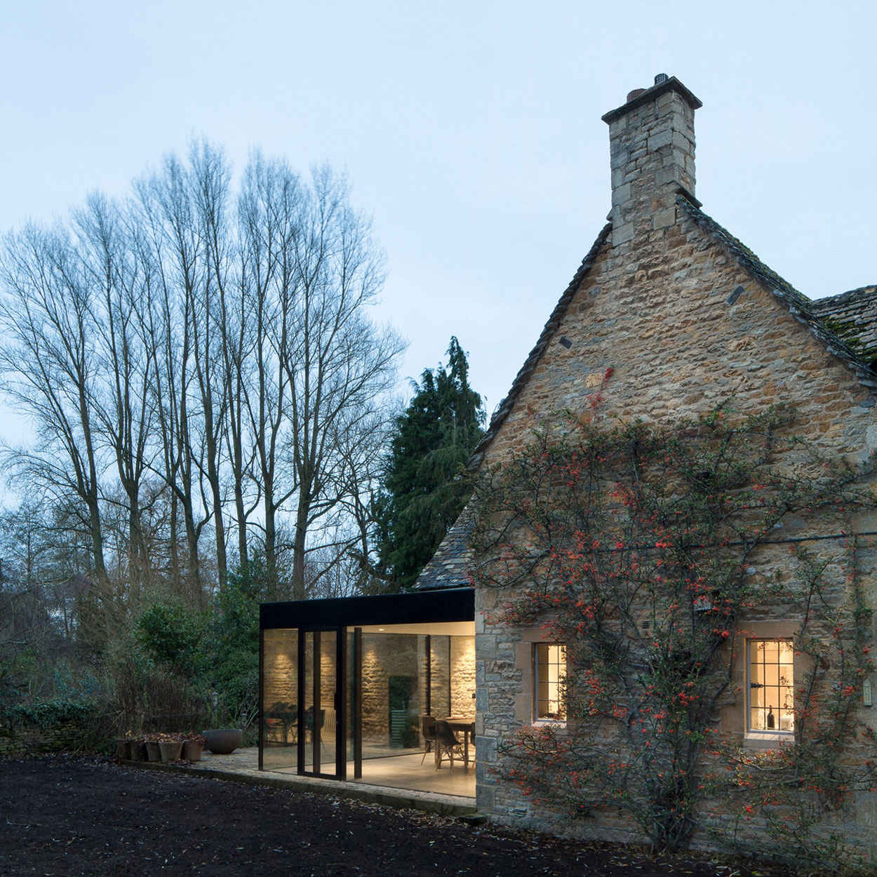 A Stylish Modern Home with Stone Walls and Glass Facade in Oxford, England by Jonathan Tuckey Design (3)