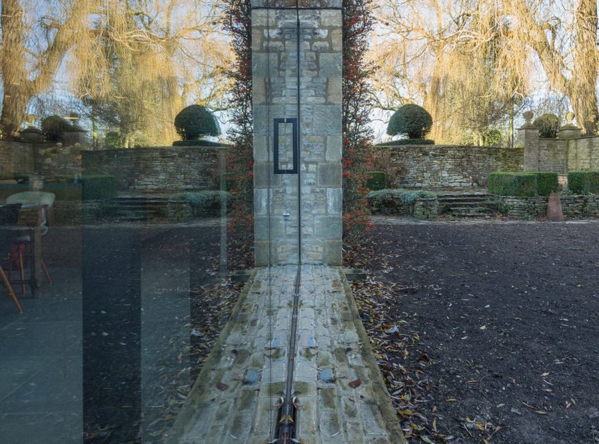 A Stylish Modern Home with Stone Walls and Glass Facade in Oxford, England by Jonathan Tuckey Design (4)