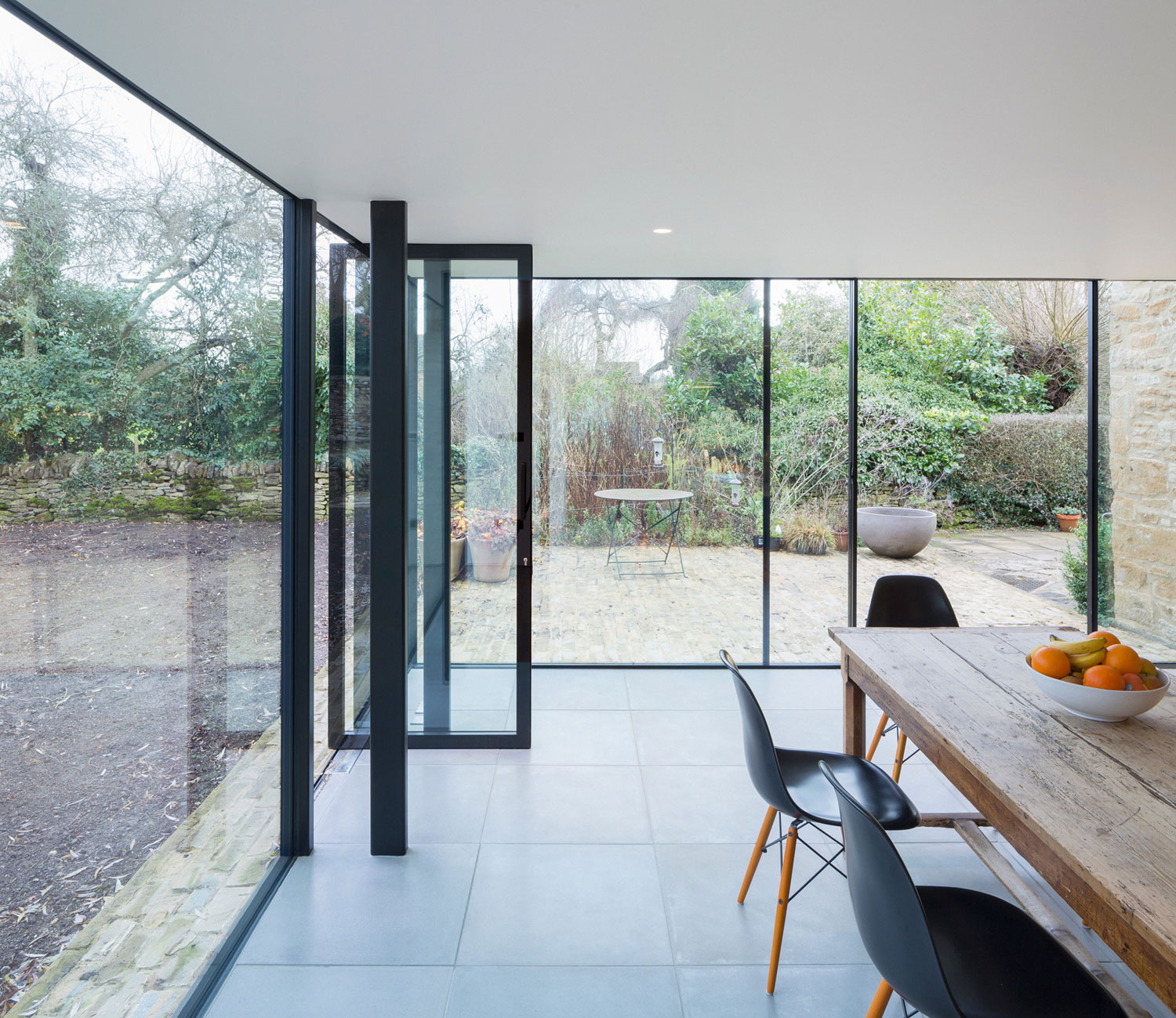 A Stylish Modern Home with Stone Walls and Glass Facade in Oxford, England by Jonathan Tuckey Design (9)