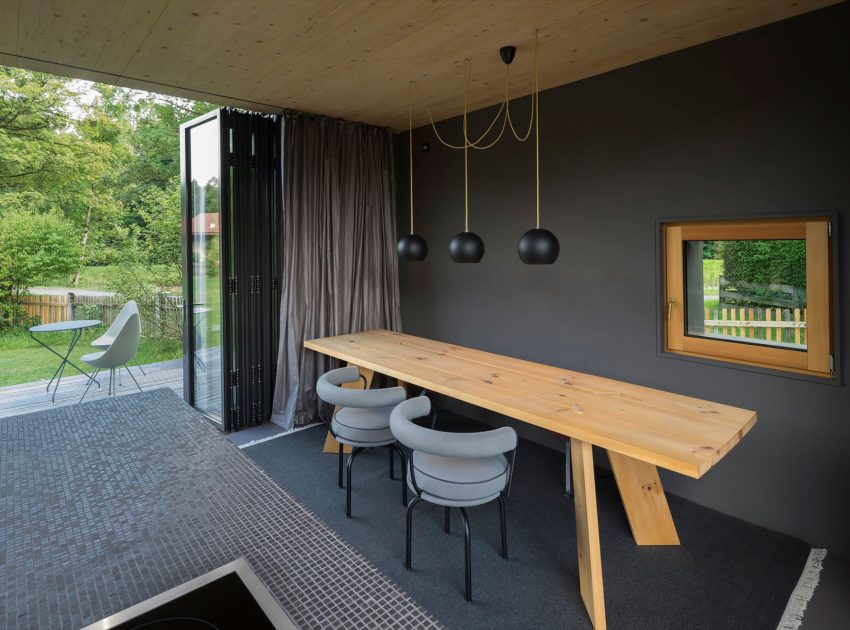 A Stylish Modern Wooden House with Cantilevered Terrace in Auerbach, Germany by Arnhard & Eck (16)