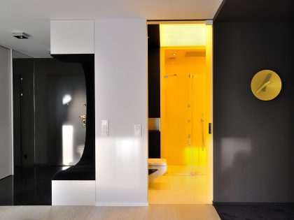 A Stylish and Futuristic Modern Apartment with Multicolor Interiors in Gdynia, Poland by MSWW (16)
