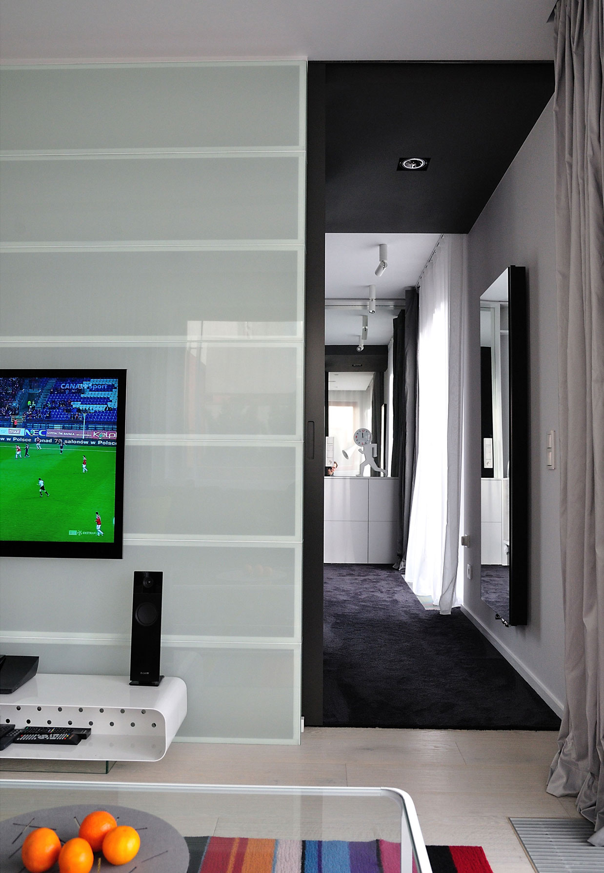 A Stylish and Futuristic Modern Apartment with Multicolor Interiors in Gdynia, Poland by MSWW (3)