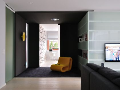A Stylish and Futuristic Modern Apartment with Multicolor Interiors in Gdynia, Poland by MSWW (8)