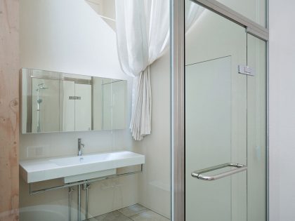 A Unique House with Geometric Shapes and Colorful Interiors in Niigata Prefecture by Kochi Architect’s Studio (6)