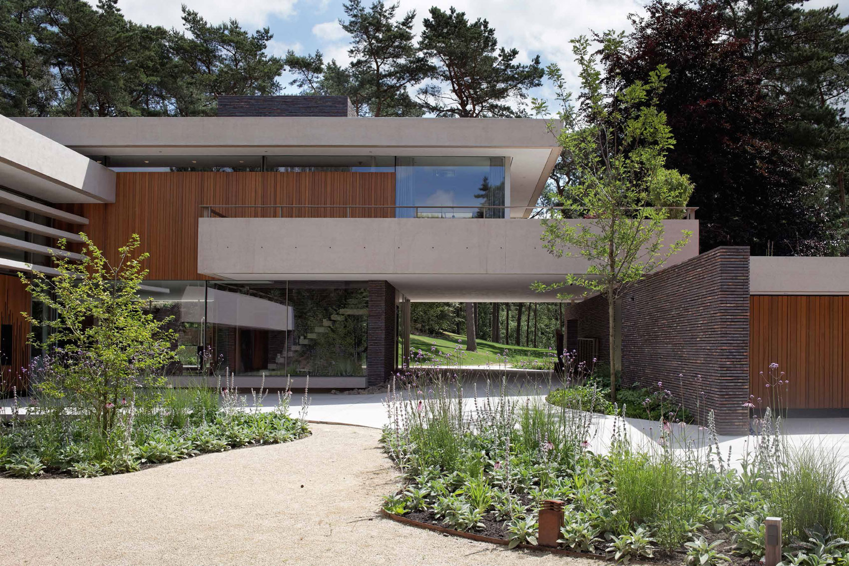 A Unique and Stylish Modern Home in the Pine Forest in Utrecht, The Netherlands by HILBERINKBOSCH Architects (3)