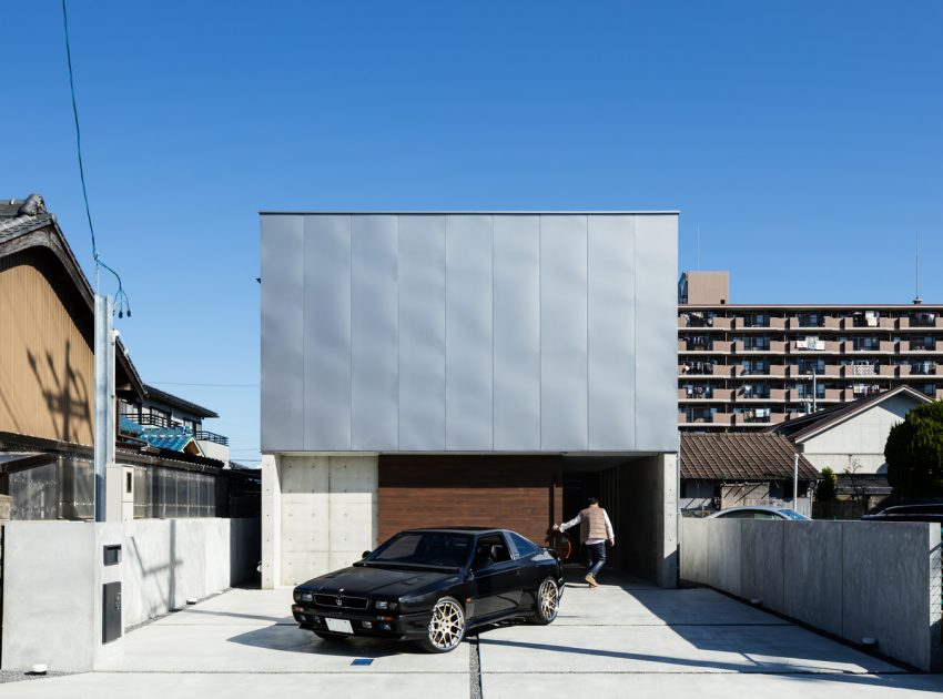 A Warm and Cozy Concrete Home for a Car and Bike Enthusiast in Kawagoe by Horibe Associates (1)