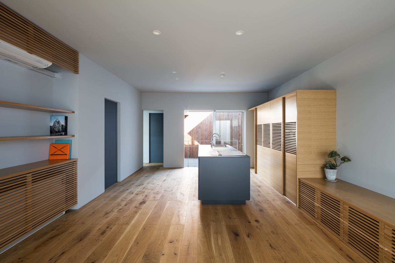 A Warm and Cozy Concrete Home for a Car and Bike Enthusiast in Kawagoe by Horibe Associates (10)