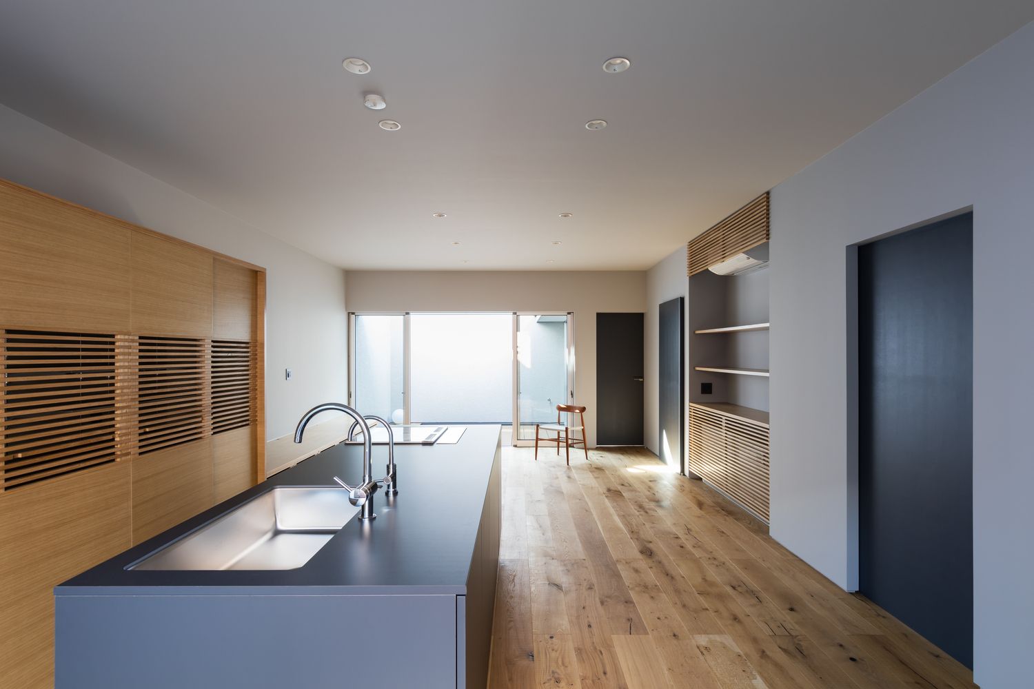 A Warm and Cozy Concrete Home for a Car and Bike Enthusiast in Kawagoe by Horibe Associates (12)