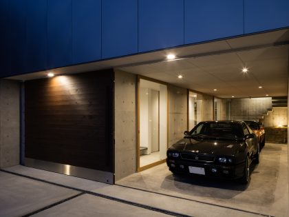 A Warm and Cozy Concrete Home for a Car and Bike Enthusiast in Kawagoe by Horibe Associates (15)