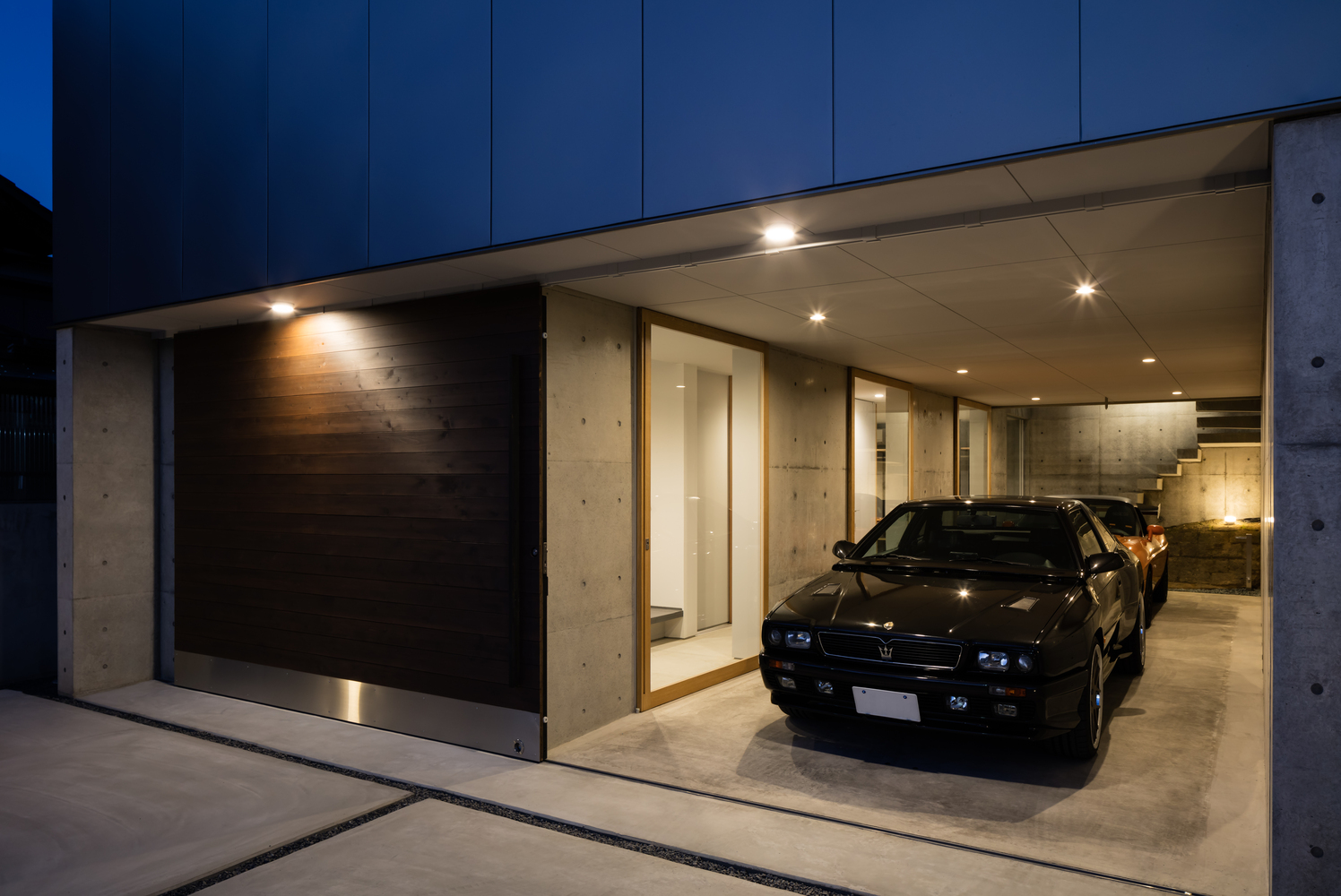 A Warm and Cozy Concrete Home for a Car and Bike Enthusiast in Kawagoe by Horibe Associates (15)